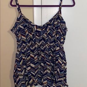 Baby doll sleeveless blouse.